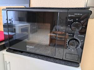 Kuchyň nebo kuchyňský kout v ubytování Apartment Curly