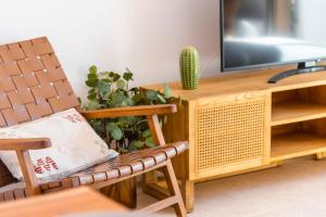 TV a/nebo společenská místnost v ubytování MEDANO4YOU Corey's Beach Holiday Home