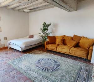 Posteľ alebo postele v izbe v ubytovaní Ancien hôtel particulier avec patio