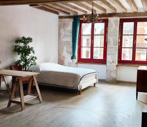 Posteľ alebo postele v izbe v ubytovaní Ancien hôtel particulier avec patio