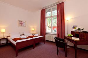 Postel nebo postele na pokoji v ubytování Hotel Morgenland
