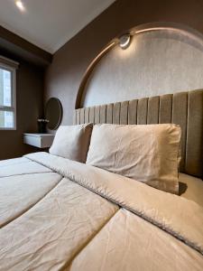 Postel nebo postele na pokoji v ubytování R20 Apartment Daymentroom 2BR 0620
