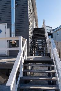 a set of stairs leading up to a building at Hotel Nuka in Ilulissat