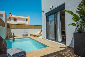 Bazén v ubytování Anemmaro Villa 1 in Crete nebo v jeho okolí + 23 fotografií