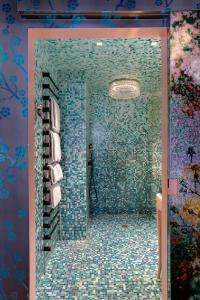 Salle de bains dans l'établissement Small Luxury Hotel De Witte Lelie