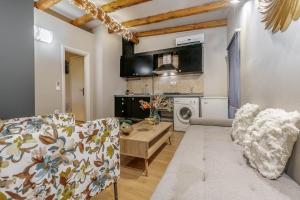 TV/trung tâm giải trí tại VENETIAN WELL House by LOC HOSPITALITY