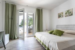 Postel nebo postele na pokoji v ubytování Villa Simonetta - Apulia Home