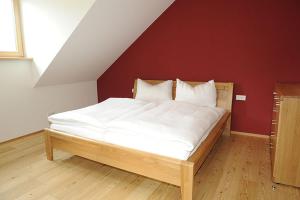 Łóżko lub łóżka w pokoju w obiekcie Premium Appartements Di Bora