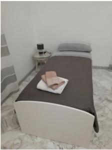 A bed or beds in a room at Mary's House