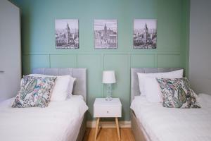 Katil atau katil-katil dalam bilik di Modern central Penthouse - 1 FreeParking