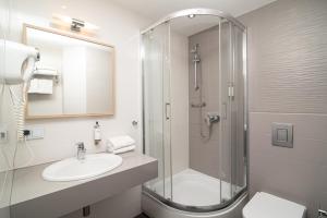 Koupelna v ubytování Antares Hotel
