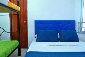 Postel nebo postele na pokoji v ubytování Ayenda Hotel Roisa