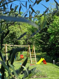 a park with a playground with a swing at Villa Destiny Nedescina, Istrien, Kroatien in Nedeščina +33 photos