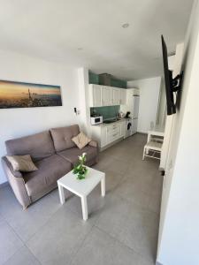 Kuchyň nebo kuchyňský kout v ubytování Apartamentos Centro Ronda 3