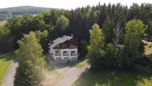 an aerial view of a house in the middle of trees at Penzion Jas in Luhačovice