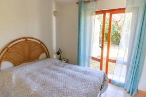 Ένα ή περισσότερα κρεβάτια σε δωμάτιο στο Residenze Turagri
