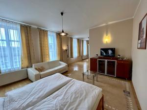 A television and/or entertainment centre at Hotel Roháč