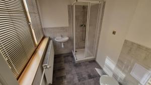 Koupelna v ubytování Hotel Rada