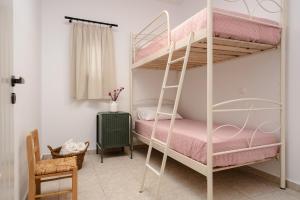 A bed or beds in a room at Orkos Naxian Wave 3