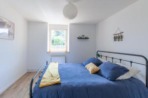 Postel nebo postele na pokoji v ubytování La Grange - Charmante maison à Langrune-sur-mer