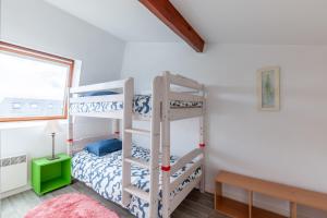 Postel nebo postele na pokoji v ubytování Duplex Croisette - Duplex à Bernières-sur-Mer