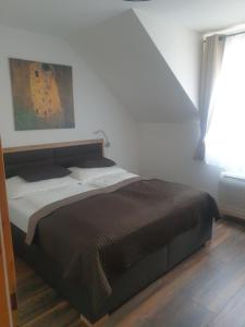 Posteľ alebo postele v izbe v ubytovaní Ferienhaus Apetlon + 30 fotografií