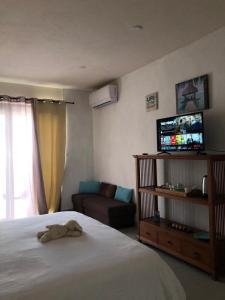 Rúm í herbergi á Amalfi Villa