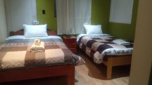 Postel nebo postele na pokoji v ubytování Casa Salkantay Cusco + 37 fotografií