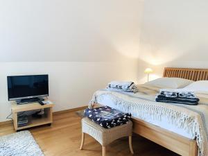 Postel nebo postele na pokoji v ubytování Haus Pamir App 16
