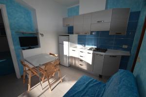 Imagen de la galería de Appartamenti SABBIA - Zona mare con terrazze, clima, e posti auto, en Marina di Campo