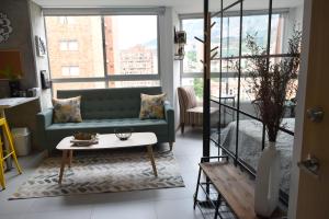 Khu vực ghế ngồi tại Moderno y agradable apartaestudio en el centro de Medellin