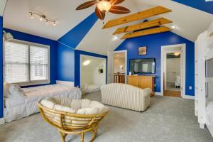 a bedroom with blue walls and a ceiling at Spacious Ocean City Home - Walk to Beach! in Ocean City