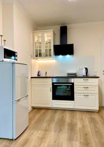 Kuchyň nebo kuchyňský kout v ubytování Wohnung im Erdgeschoss