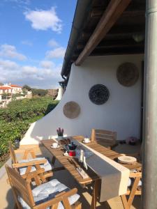 Ein Balkon oder eine Terrasse in der Unterkunft Casa Su Soli Sardu 10 - Mit Blick aufs Meer!