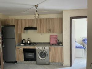 Kuchyň nebo kuchyňský kout v ubytování smir park Mdiq