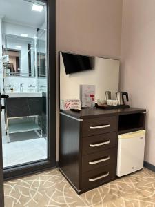 Kuchyň nebo kuchyňský kout v ubytování Astor Hotel