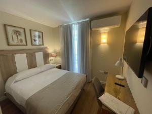 Posteľ alebo postele v izbe v ubytovaní Olivae Hostal Boutique