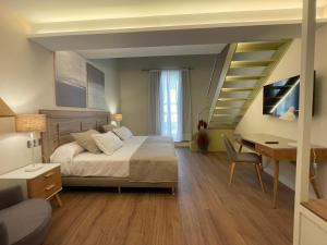 Posteľ alebo postele v izbe v ubytovaní Olivae Hostal Boutique