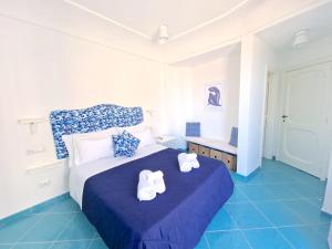 Voodi või voodid majutusasutuse Il Cantuccio Rooms toas +27 fotot