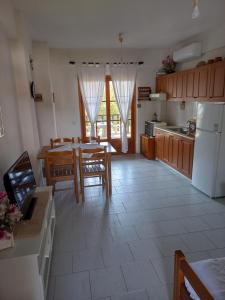 Kuchyň nebo kuchyňský kout v ubytování Pax Summer Apartment