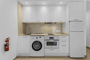 Kuchnia lub aneks kuchenny w obiekcie Casahost Bastian Boutique II Seaview