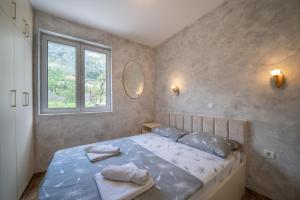 Postel nebo postele na pokoji v ubytování Apartman Anja