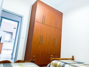 Postel nebo postele na pokoji v ubytování Kimi apartments