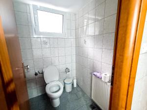 Koupelna v ubytování Kimi apartments
