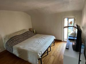 Postel nebo postele na pokoji v ubytování Chez Michou au calme Marseille