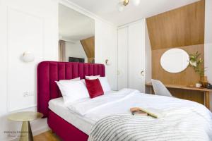מיטה או מיטות בחדר ב-Mariacka Residence
