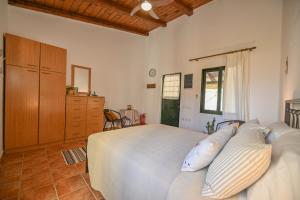 Posteľ alebo postele v izbe v ubytovaní Seaside House in Ravdouha