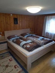 Postel nebo postele na pokoji v ubytování Oberhöher Apt Talblick