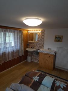 Postel nebo postele na pokoji v ubytování Oberhöher Apt Talblick