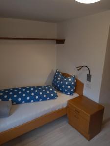 Postel nebo postele na pokoji v ubytování Oberhöher Apt Talblick